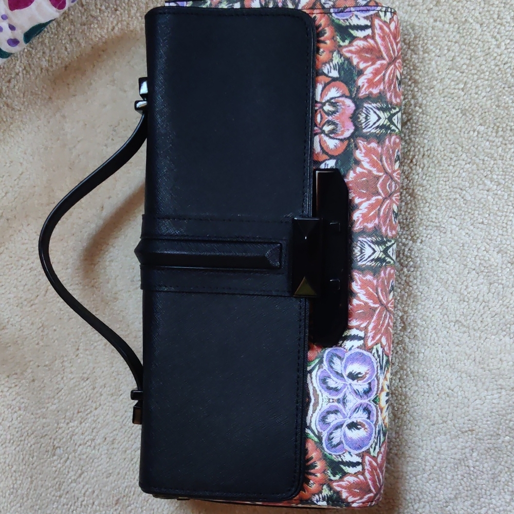 Rebecca Minkoff top handle clutch like brand new only worn once.